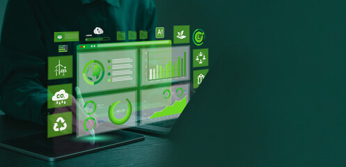 Businessman analyze sustainability investment with icons and Green chart. Concept of ESG, Green businesses, Net zero, Green energy, Carbon neutral, Green technology, and Carbon credit. CSR.