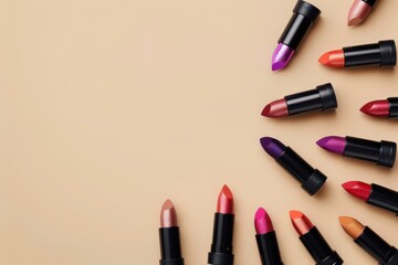 Canvas Print - Colorful lipsticks displayed on beige background with copy space Beauty and cosmetics concept Cosmetics makeup lipstick beauty brand