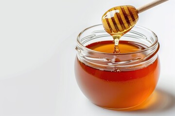 Poster - Dark chestnut honey dripping from dipper into glass jar on white background