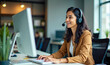 © Reubens Stock Photos - Indian Female Customer Support Representative Smiling While Assisting Clients on Computer