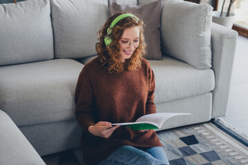 Photo of cheerful charming adorable woman wear stylish clothes hold read copybook homework indoors house home