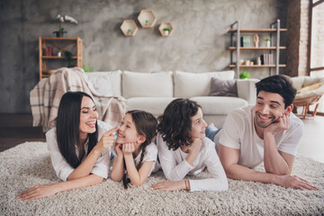 Poster - Photo of positive good mood parents children dressed casual clothes spending time together indoors house apartment room