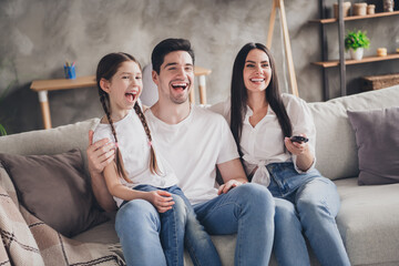 Poster - Photo of beautiful cute child dad mom dressed casual clothes enjoy movie indoors house apartment room