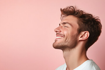 Wall Mural - A close up of a man's face with his eyes closed