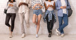 © Prostock-studio - Cropped of multiracial students uisng mobile phones, leaning on white wall, social media addiction concept, panorama