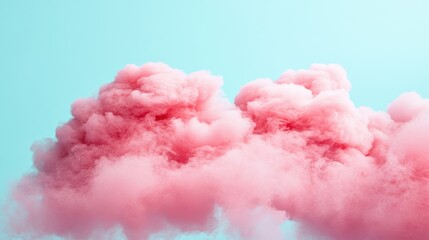 Canvas Print - A pink cloud is flying in the sky with a blue background, AI