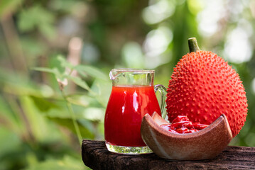 Wall Mural - Gac fruit and juice on natural background.