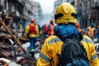 © DachAI - A rescue worker wearing a yellow helmet and jacket is seen from the back as they navigate through a disaster area, showcasing the dedication and bravery of first responders.