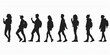 © xartproduction - Silhouettes of diverse individuals walking together in a casual urban setting