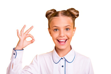 Wall Mural - Close-up portrait of her she nice attractive lovely sweet cheerful cheery confident optimistic pre-teen girl wearing white shirt showing ok-sign isolated on bright vivid shine yellow background