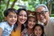 © James - Big family, portrait smile and selfie for happy quality bonding together for fun day in the nature park. Parents, grandparents and kids faces smiling for family time, photo or holiday, Generative AI