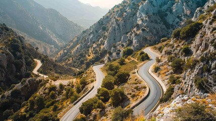 Wall Mural - Create an image of a mountain road with sharp turns and steep inclines, capturing the adventure and challenge of the drive.