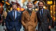 © Рудой Максим - Three well-dressed men walk together on a bustling city street during the late afternoon