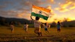 © tanayoch - A joyful child runs freely with an Indian flag in a vibrant sunset landscape, celebrating freedom and unity.