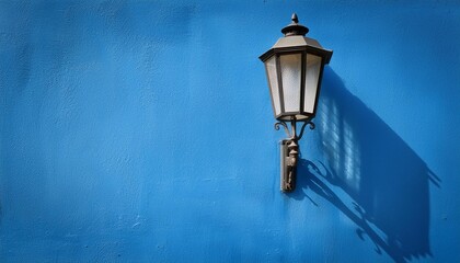 Vintage Street Lamp Against Blue Wall