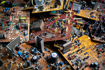 pile of electronic circuit board waste in room, recycling industry, used electronic waste. tv circui