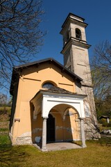 Wall Mural - The old church in a sunny day, north Italy