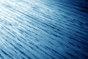 Wall Mural - Oak wood texture with blur effect close up in navy blue stain