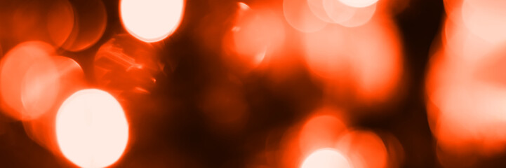 Wall Mural - Blurred lights, dark orange background, banner texture. Abstract bokeh with soft light header. Wide screen wallpaper. Panoramic web banner with copy space for design