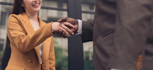 Cropped shot of two people shaking hands. Closeup shot of business handshake. Business handshake concept