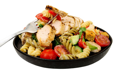 Chicken and pasta salad meal with roasted chicken breast isolated on a white background