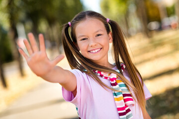 Canvas Print - Photo portrait of ponytails pretty small girl cheerful smile wave hand wear trendy outfit elementary school student walk park