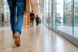 © Pompozzi - People Walking in Modern Office Corridor