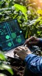 © Sasa Visual - Professionals and farmers examine agricultural insights on a laptop surrounded by greenery