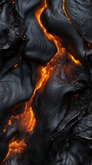 Canvas Print - Molten lava flowing between cooling igneous rock