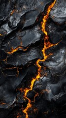 Canvas Print - Molten lava flowing between rocks creating glowing crack