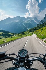 Wall Mural - A motorcycle rides along a winding road surrounded by mountains, perfect for outdoor adventures and travel photos