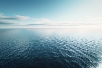 Wall Mural - A large body of water with a clear blue sky in the background