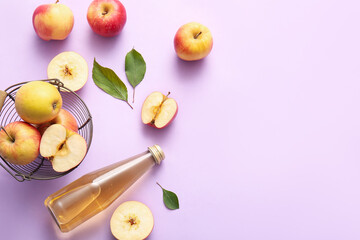 Wall Mural - Composition with fruits, bowl and bottle of fresh apple cider on lilac background