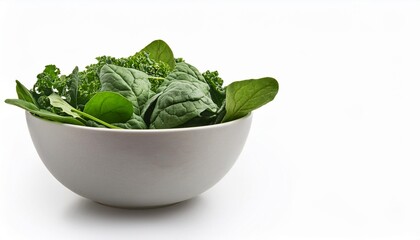 a bowl of leafy greens including fresh spinach and kale rich in vitamins and nutrients isolated on a white background