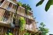 © Azhorov - A contemporary building showcases bamboo architecture adorned with various plants and trees under a clear blue sky. Generative AI