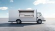 © sa-photo - A sleek food truck on a blank concrete lot, ready for logo placement. Simple urban scenery with space around the truck.