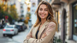 © Kavidu - Happy young professional business woman confident positive female entrepreneur standing outdoors with arms crossed