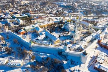 Wall Mural - Drone view of residential quarters and the Trinity-Sergius Lavra in Sergiev Posad in winter, Russia.