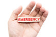 © Wongsakorn - Text EMERGENCY wooden block on hand. Financial and business concept. retirement saving concept. money saving for rainy day. isolated on white background and clipping path.