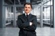 © BillionPhotos.com - Proud portrait of businessman near office.