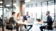 © Mari - Blurry Office Interaction Scene - Out-of-focus background capturing an office interaction scene.