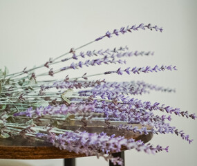 Wall Mural - English lavender stems on a table top