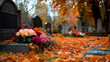 © Iryna - Somber autumn scene in a cemetery with vibrant flowers and fallen leaves, a woman mourns at a loved one's grave during All Saints' Day