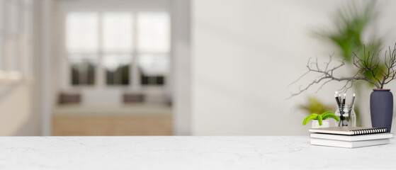 Poster - A copy space for displaying products on a white marble tabletop in a modern white room.