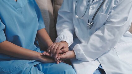 Wall Mural - Doctors hold hands and give advice to patients. Give encouragement in treat disease