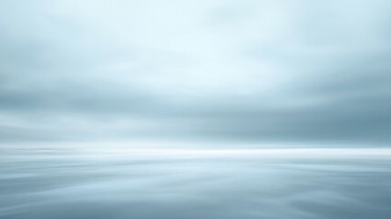 Wall Mural - A cloudy sky with a large body of water in the background