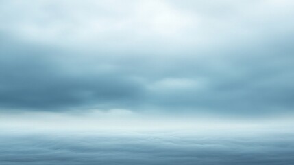 Wall Mural - A cloudy sky with a large body of water