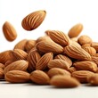© Dirty Pure - Fresh Almonds, Heap of Shelled Almonds with One Falling