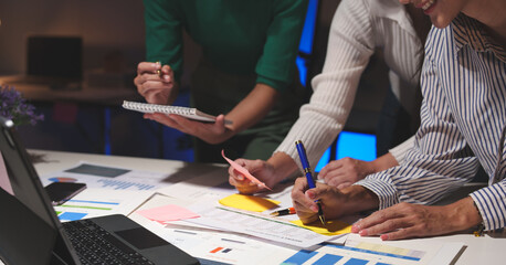 Wall Mural - Investment finance concept, group of business people pointing to the graph Business Advisory Meetings and Strategic Brainstorming financial analysis investment and marketing new business project.