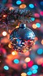 © rehan - A Shiny Disco Ball Christmas Ornament Hanging on a Christmas Tree